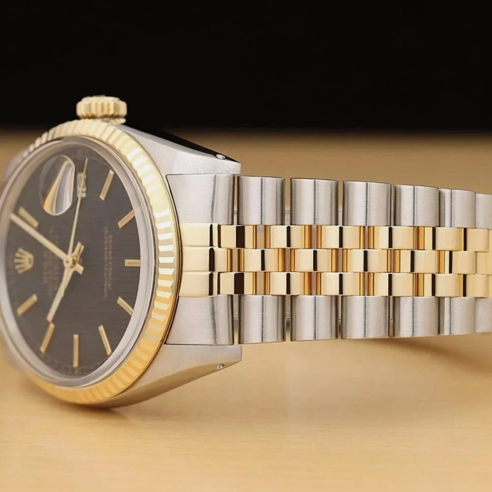ROLEX MENS DATEJUST BLACK TAPESTRY DIAL 18K YELLOW GOLD STEEL WATCH